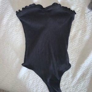 Black ruffled bodysuit